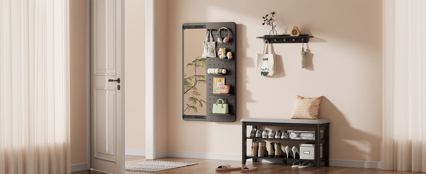 The wall mirror at the entrance can be used both for hanging clothes and for looking in the mirror