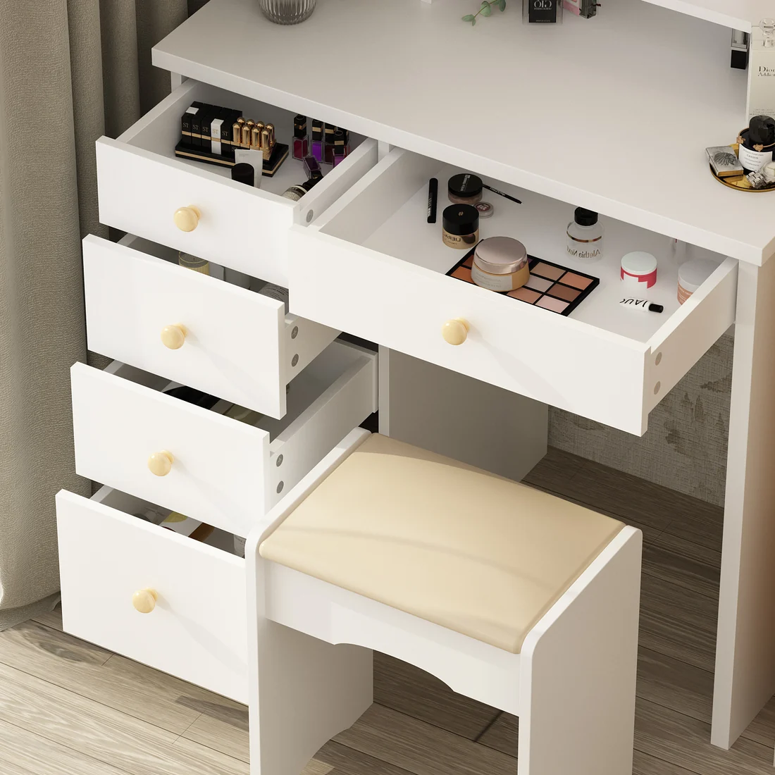 Five vanity drawers open