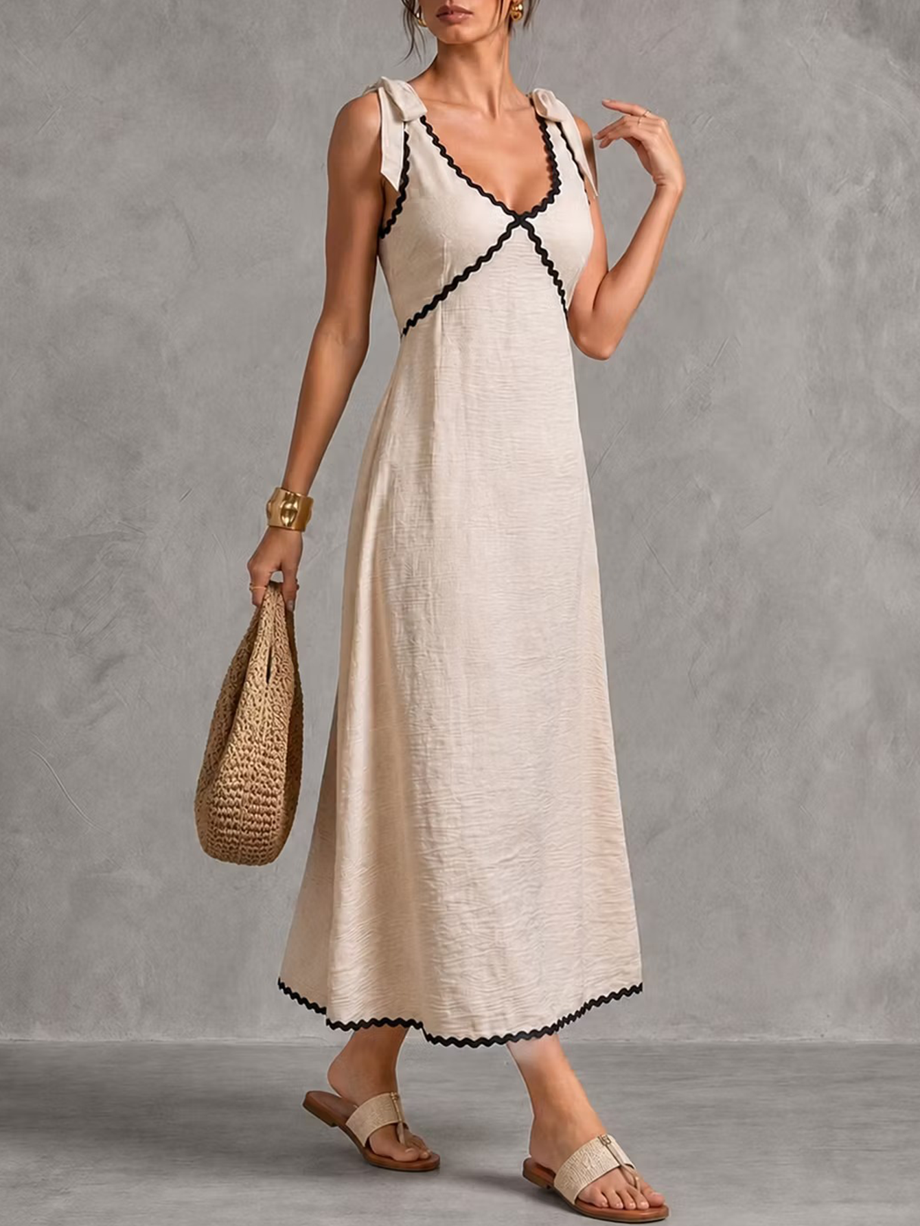 Two-Piece Set Featuring A Loose, Sleeveless, Side-Slit Top And High-Waisted Wide-Leg Trousers—Suitable For Casual Wear, Commuting, Or Vacation.