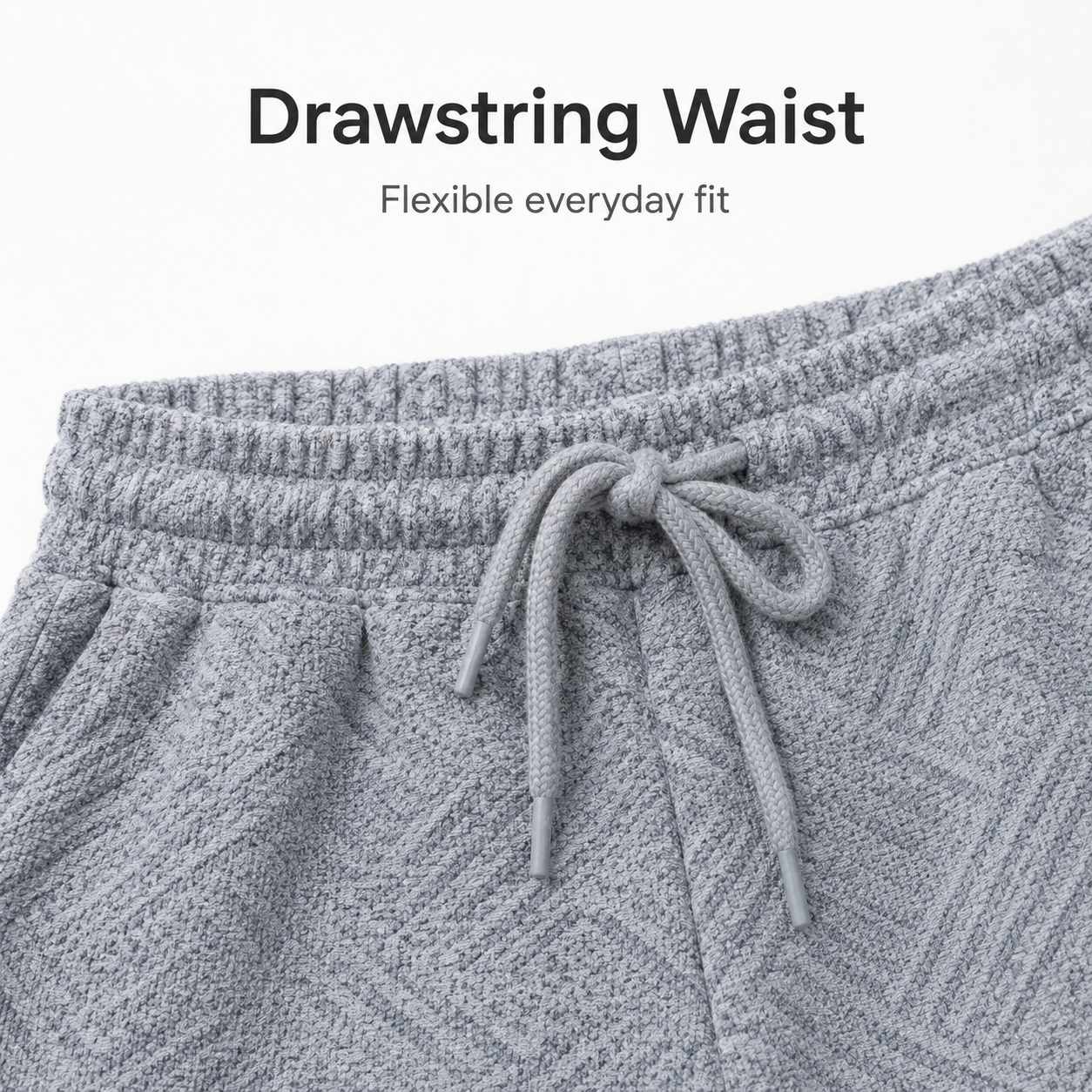 Drawstring waist detail on men's textured pants