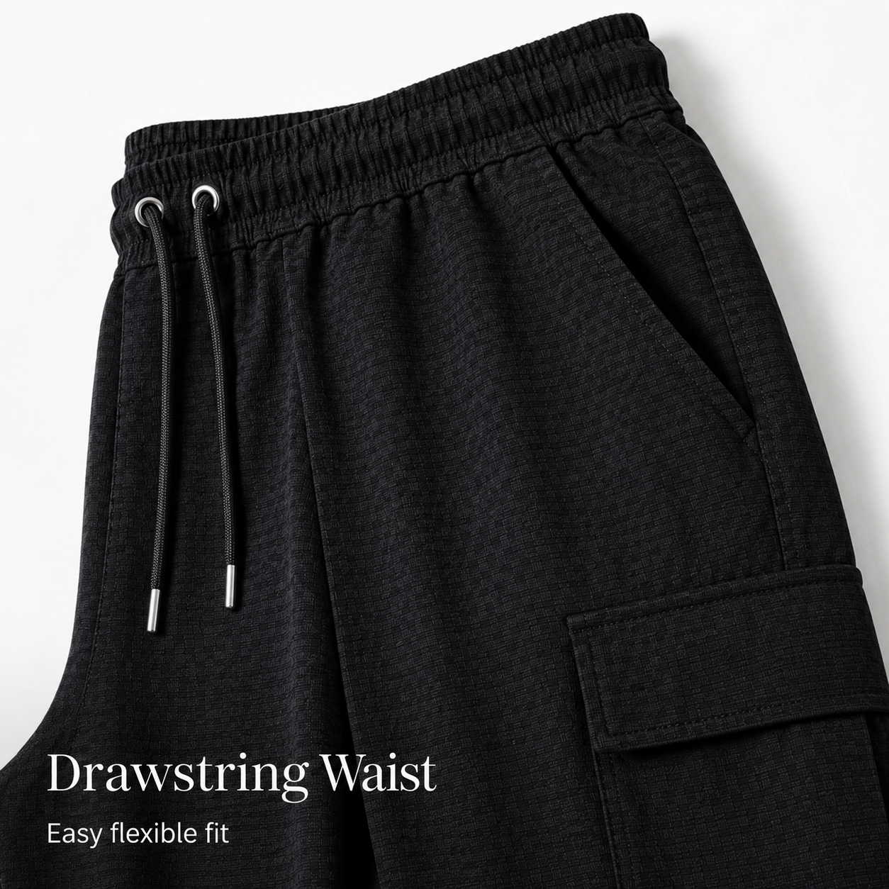 Elastic drawstring waist and cargo pocket detail on pants