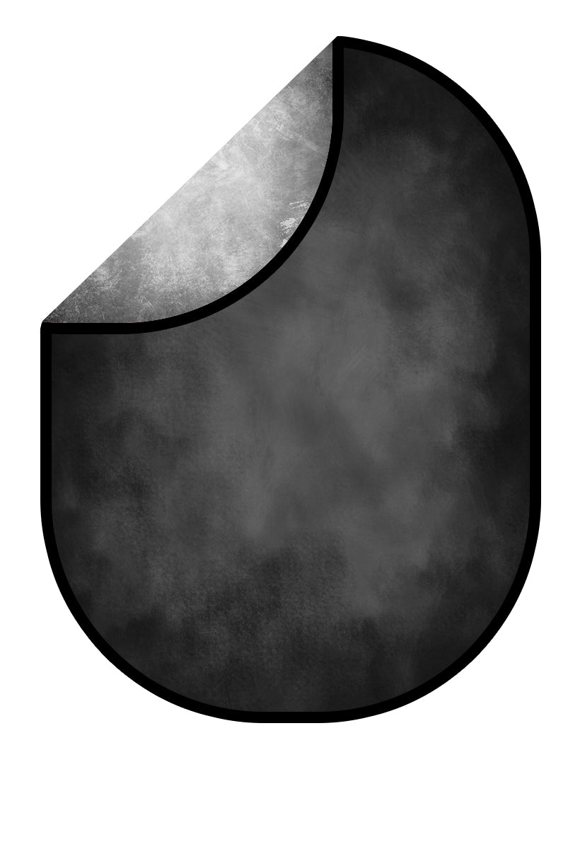 A collapsible photography backdrop featuring a black and gray abstract texture design, partially folded to show both sides.