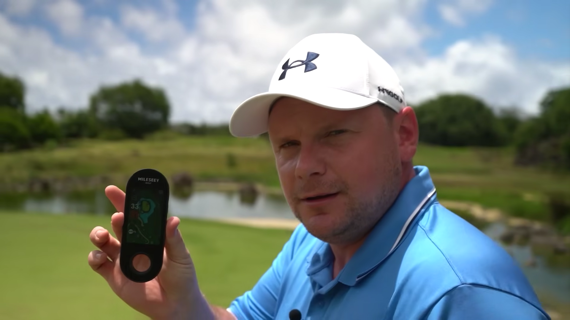 The Influencer James Robinsion Golf Showing the GPS Module of GeneSonic Pro Detachable Golf GPS Speaker