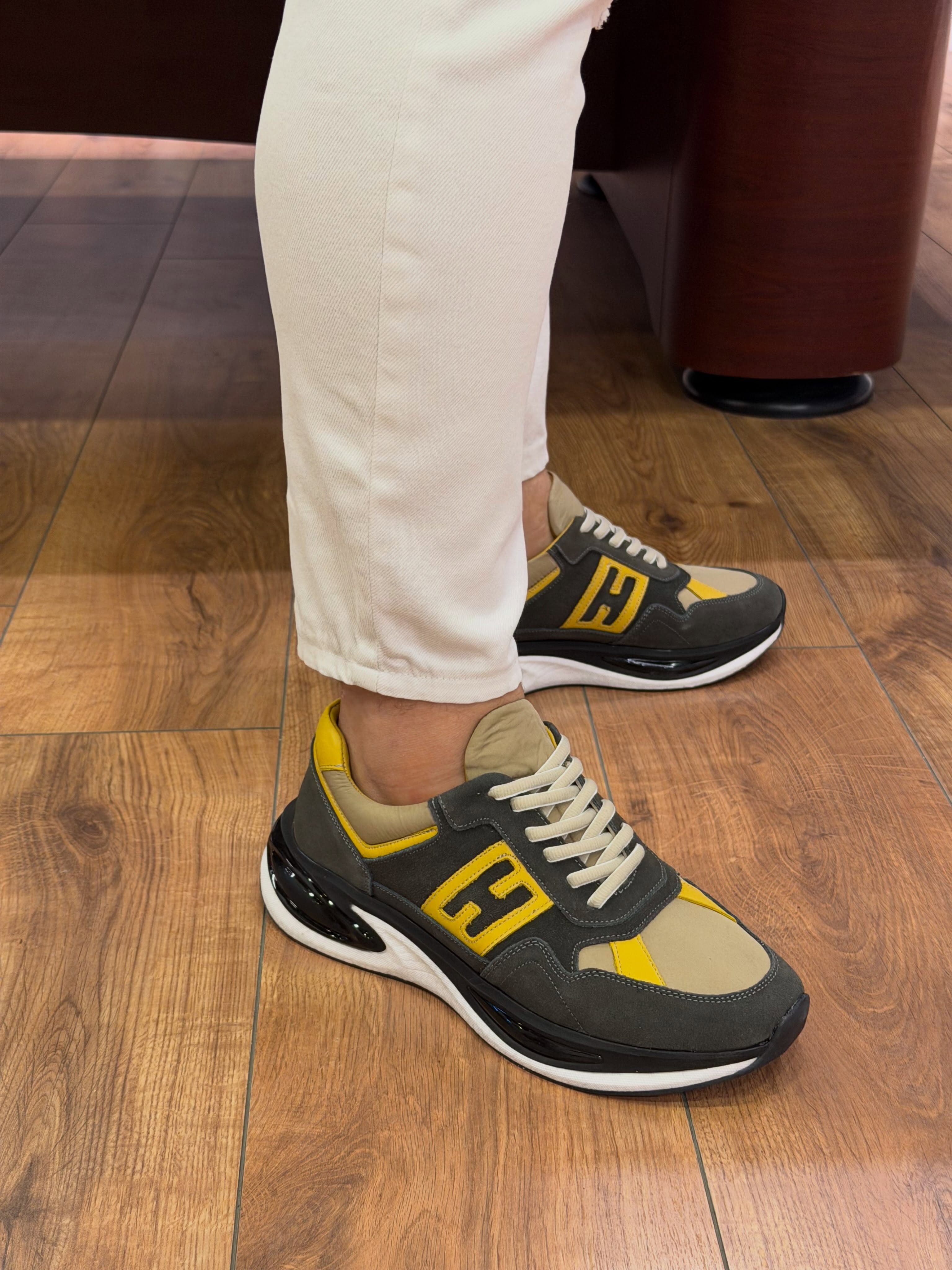 Suede Lace Up Sneaker with Bold Logo Patch and Air Cushion Sole for Sporty Urban Style