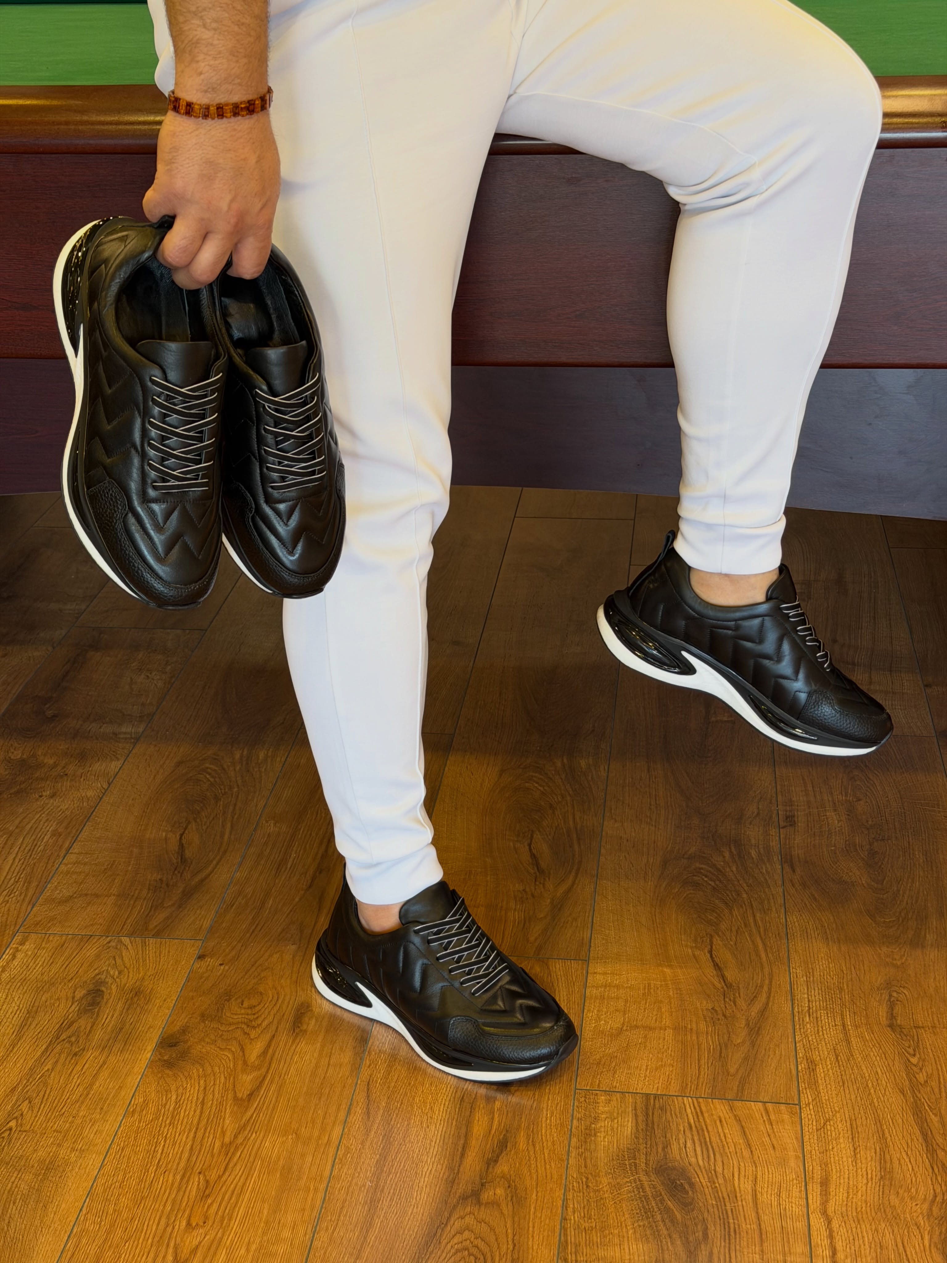 Quilted Leather Lace Up Sneaker with Air Cushion Sole and Bold Zigzag Stitching for Modern Urban Style