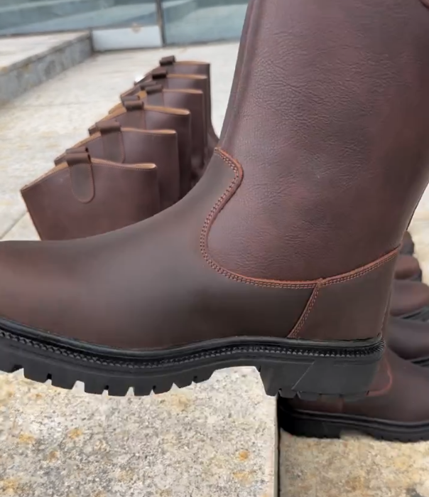 Leather Pull On Mid Calf Boot with Fleece Lining and Rugged Lug Sole for Winter Warmth and Outdoor Durability