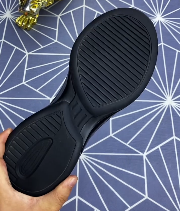 Leather Slip On Sneaker with Rotary Dial Lacing System and Textured Elastic Panel for Modern Business Casual Style