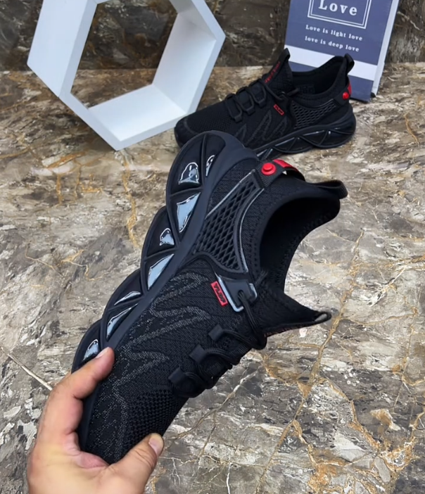 Hollow Mesh Athletic Sneaker with Geometric Blade Sole and Adjustable Strap for Futuristic Sport Style