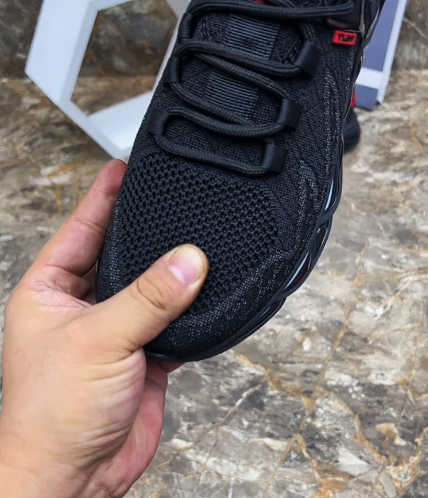 Hollow Mesh Athletic Sneaker with Geometric Blade Sole and Adjustable Strap for Futuristic Sport Style