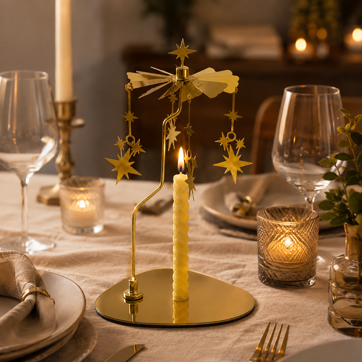 Woman lighting a candle in a gold celestial rotating star carousel