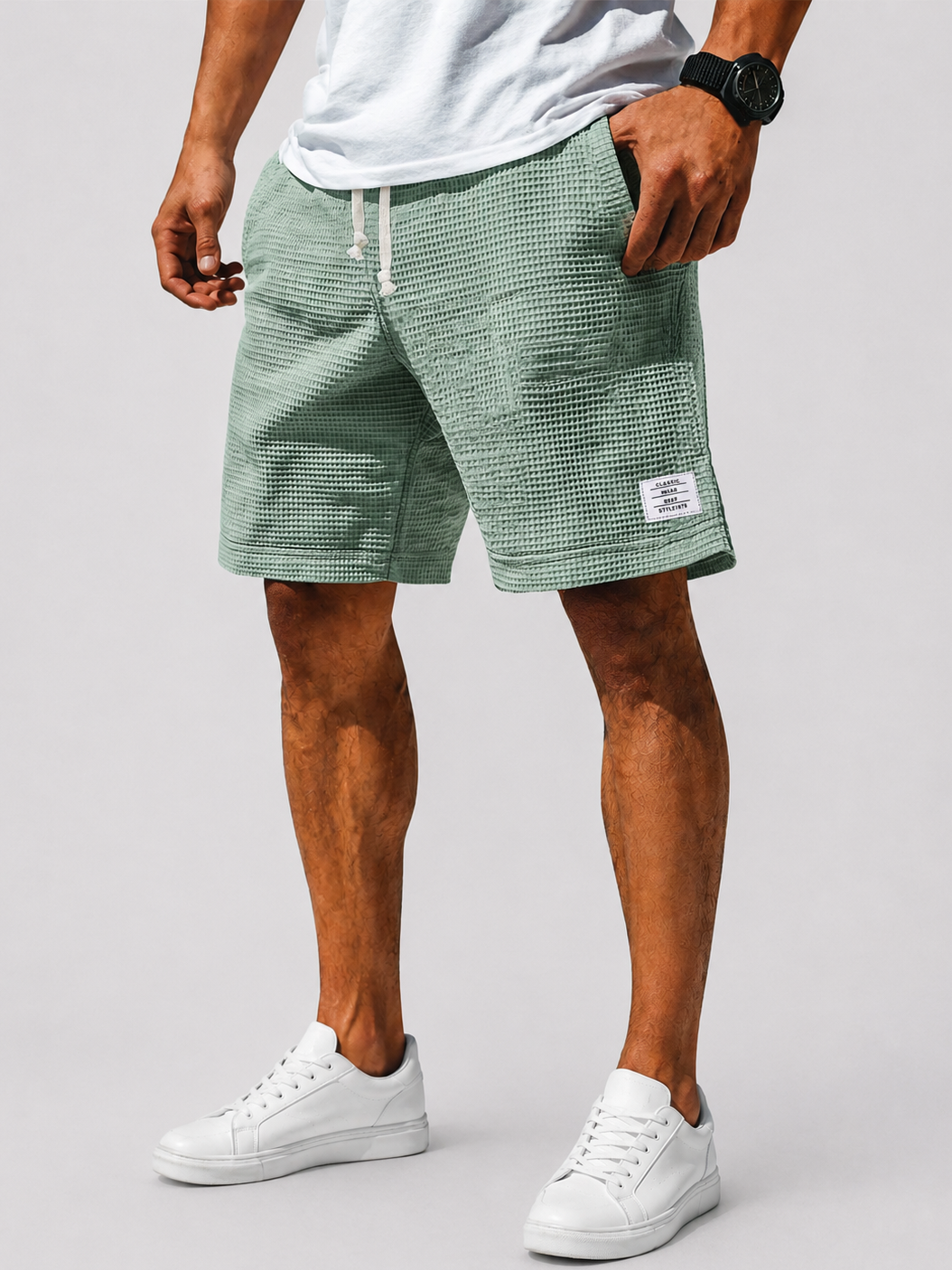Stylische, lässige Herren-Shorts aus weichem Waffelstoff mit schlichter Logo-Stickerei und Schnürung – ideal für den Alltag
