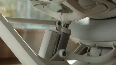 Tracking headrest moving with the reclining chair