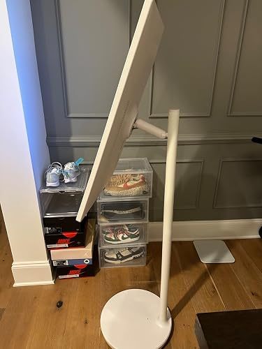 Evening customer photo of the chair and footrest in a compact study