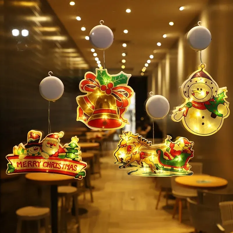 Four-light Set A with Christmas greeting, bell, sleigh and snowman