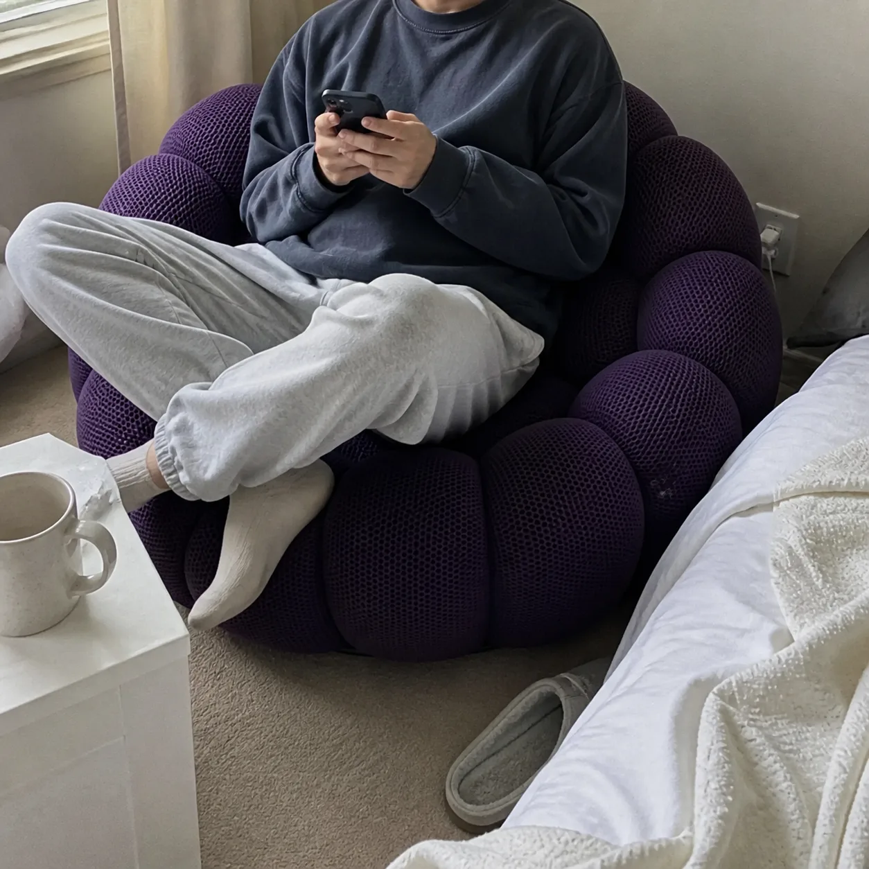 Purple Bubble Floor Sofa used beside a bed