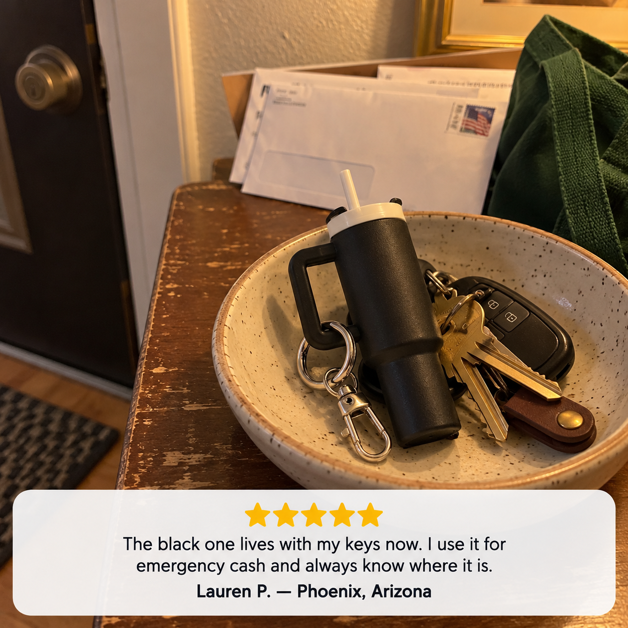 Customer review of a black mini cup beside everyday keys