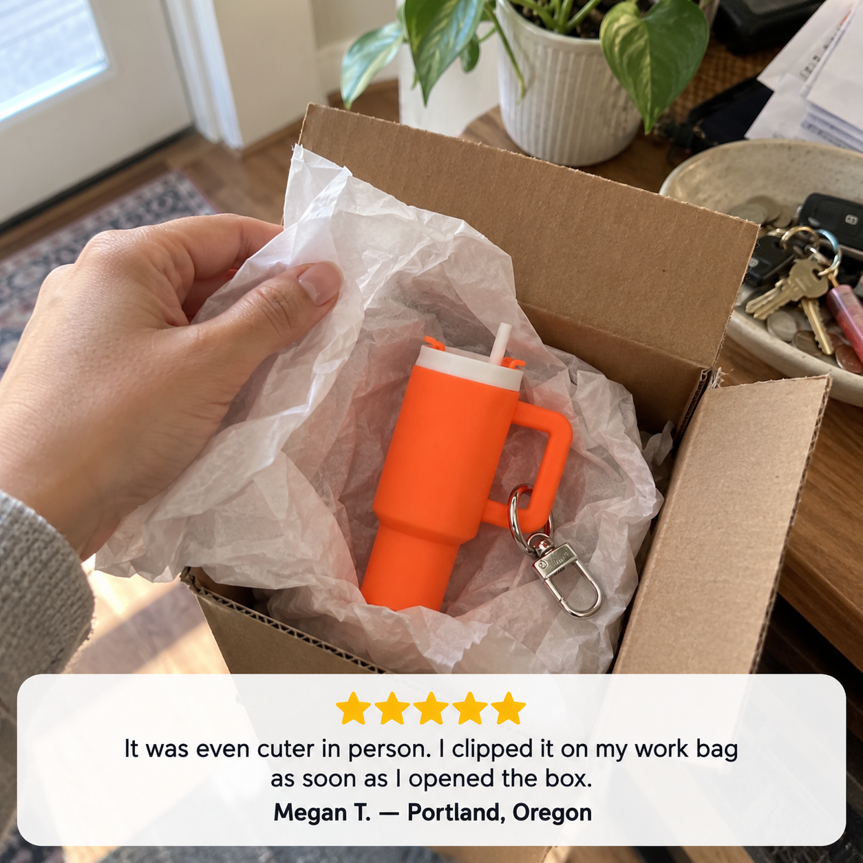 Customer review unboxing a colorful mini cup keychain