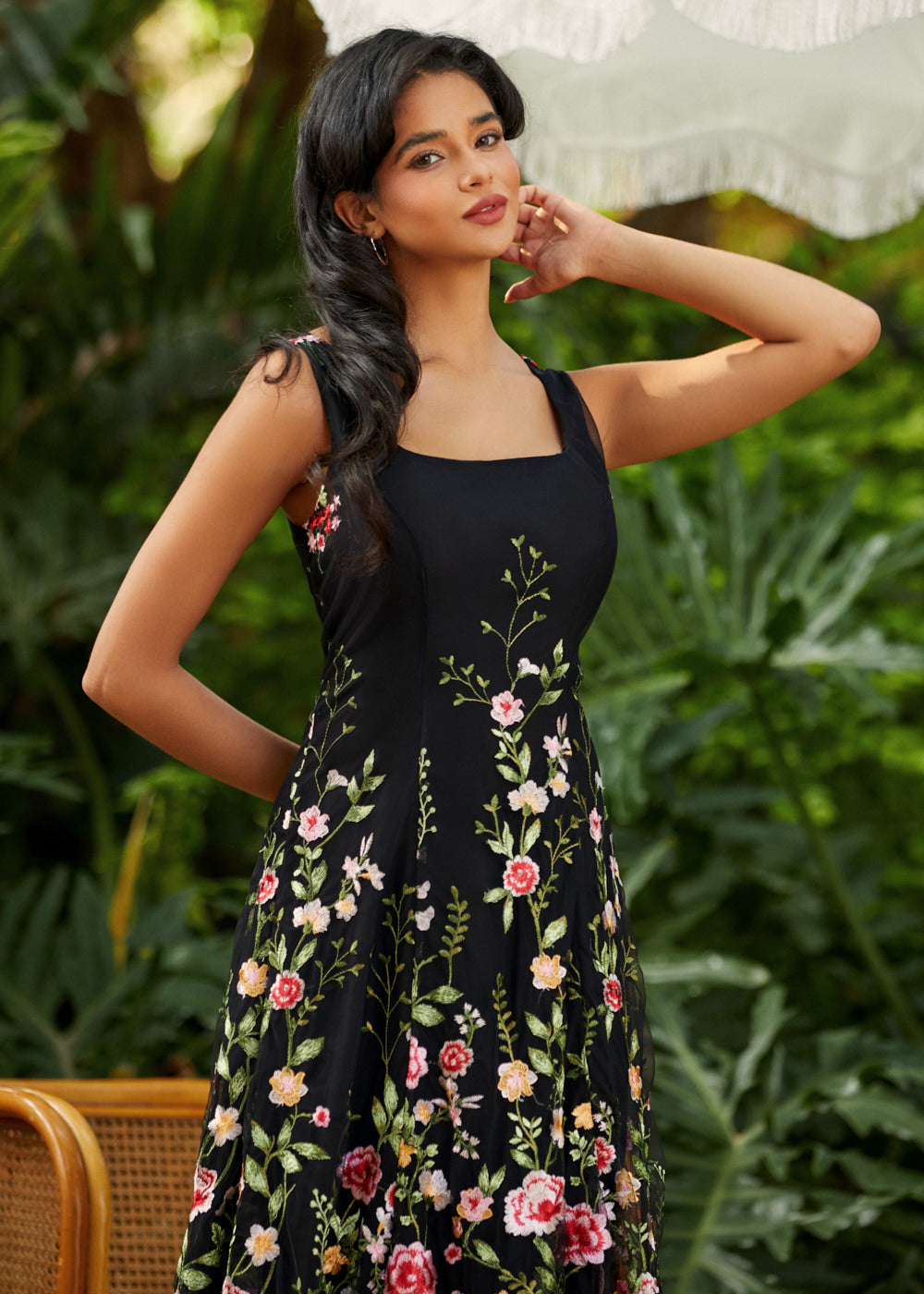 square neck a line party dress with gored panels flattering fit and flare shape angled front view