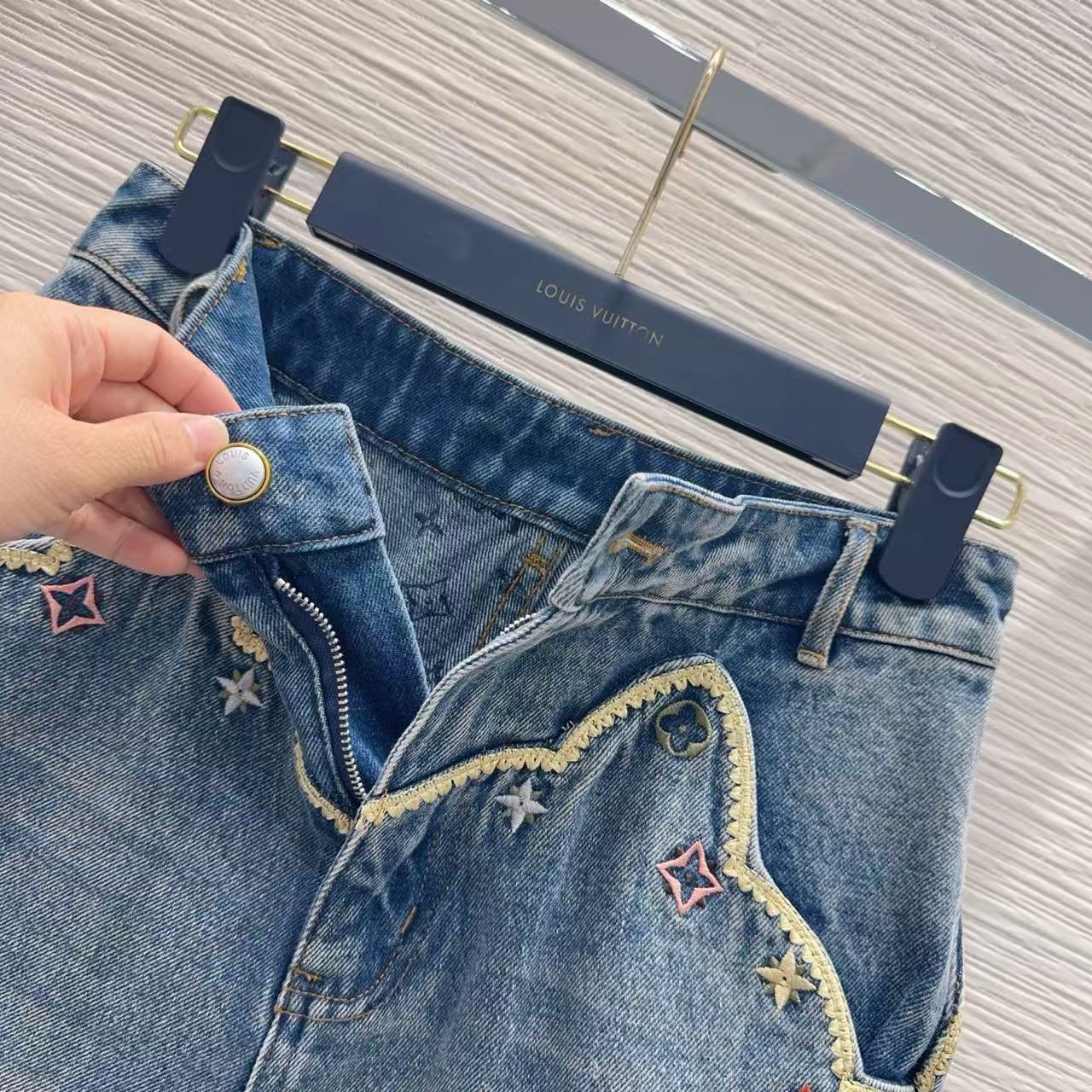 LU Vintage-Wash Embroidered Denim Hot Pants.
