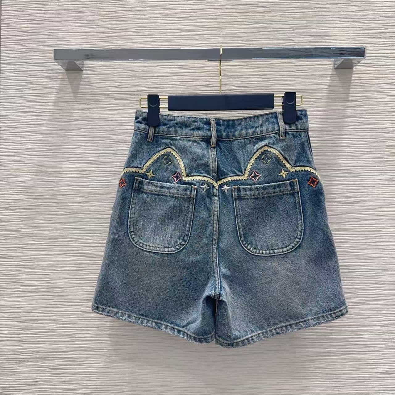 LU Vintage-Wash Embroidered Denim Hot Pants.