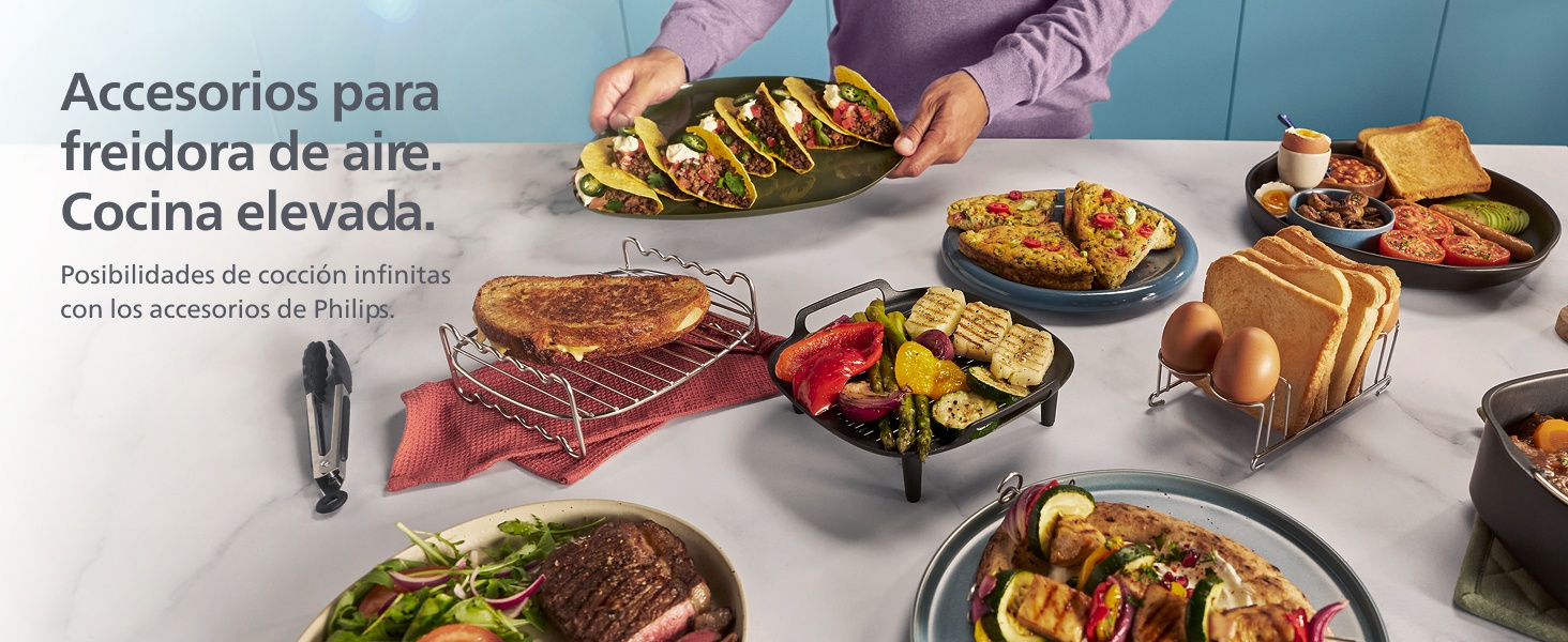 El texto dice «Imagen 4». Varios platos de comida preparada se muestran en platos oscuros sobre una superficie gris, en los que se muestran diversas comidas e ingredientes cocinados.