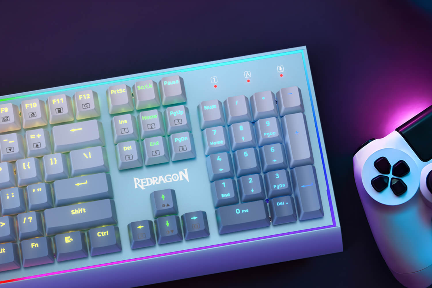 Redragon K654 Mechanical Keyboard with RGB Backlighting, Displaying Full Numeric Keypad and Customizable Function Keys, Shown Alongside a Gaming Controller for Multi-Device Compatibility