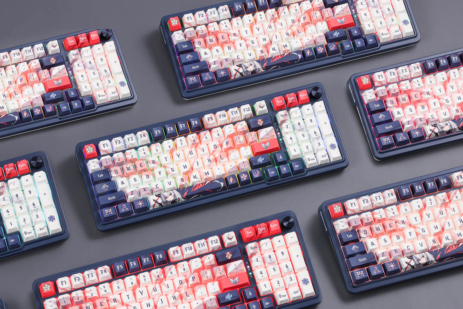 Multiple Redragon K686 PRO SE keyboards with anime keycaps and vibrant RGB backlighting laid out for display