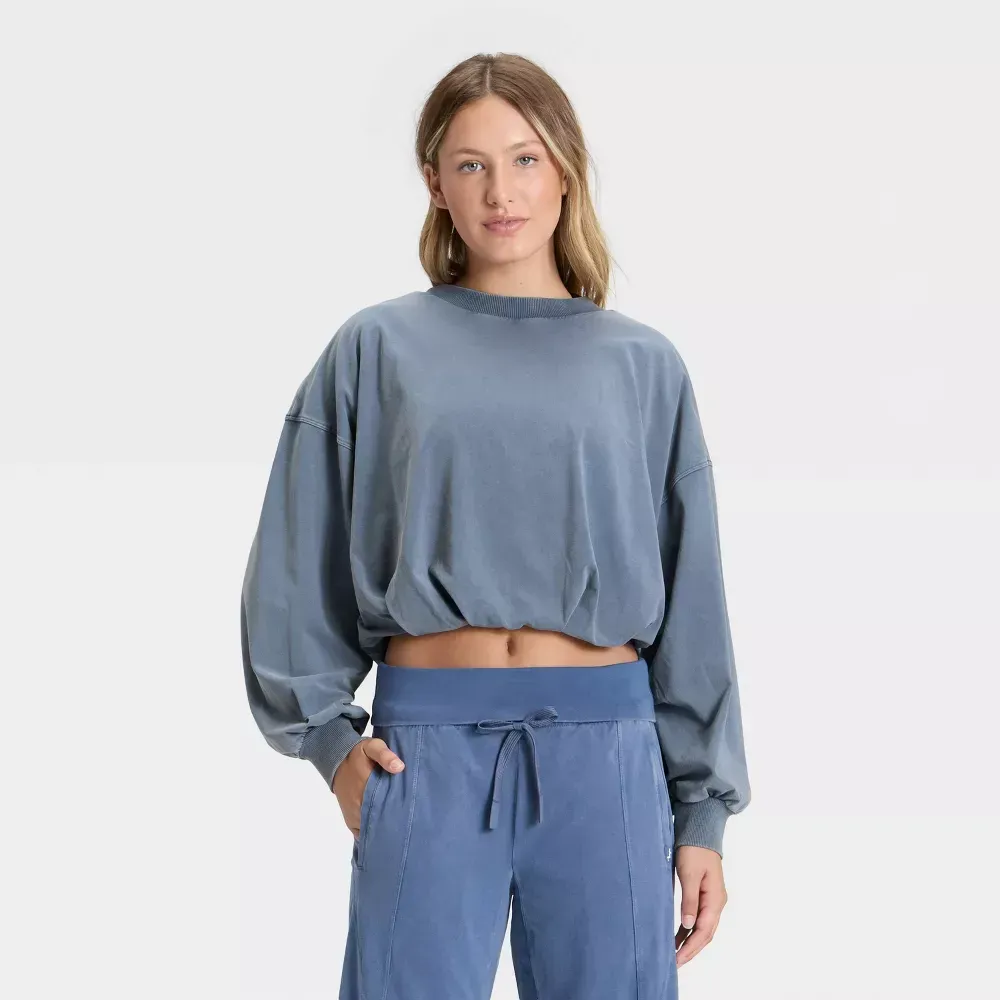 Blue bubble-hem long sleeve top, front view