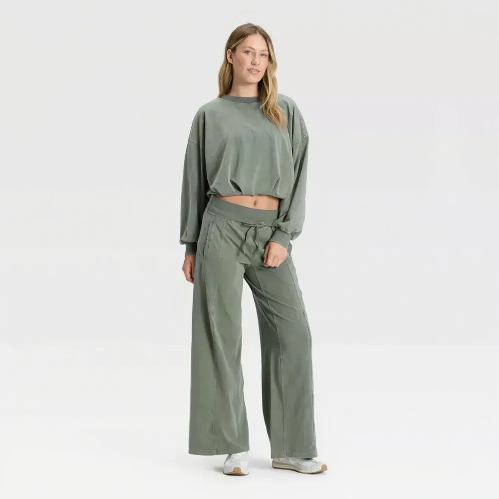 Green bubble-hem top and wide-leg pants, full outfit