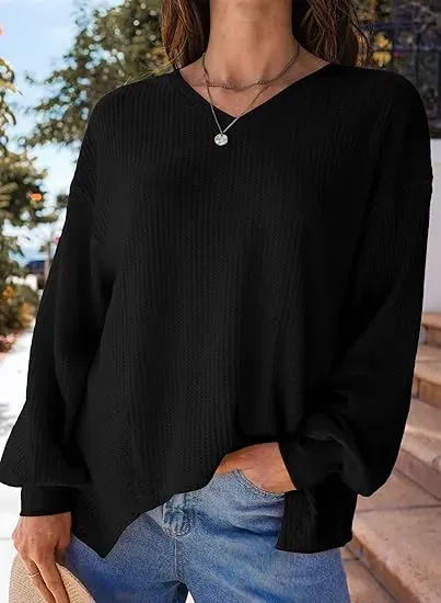Black V-neck waffle knit top, front view