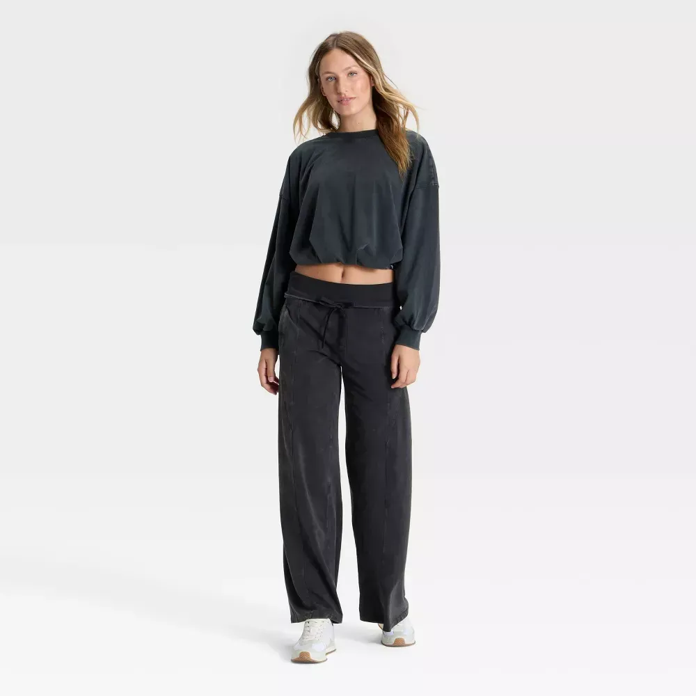 Black bubble-hem top and wide-leg pants, full outfit