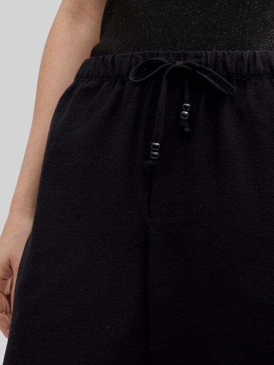 Cropped loose-fit trousers - deep black