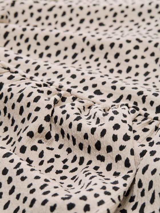Jacquard T-shirt with peplum - beige black dotted print