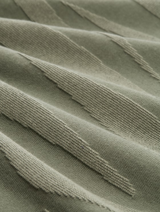 Knitted sweater with texture - green wave knit design