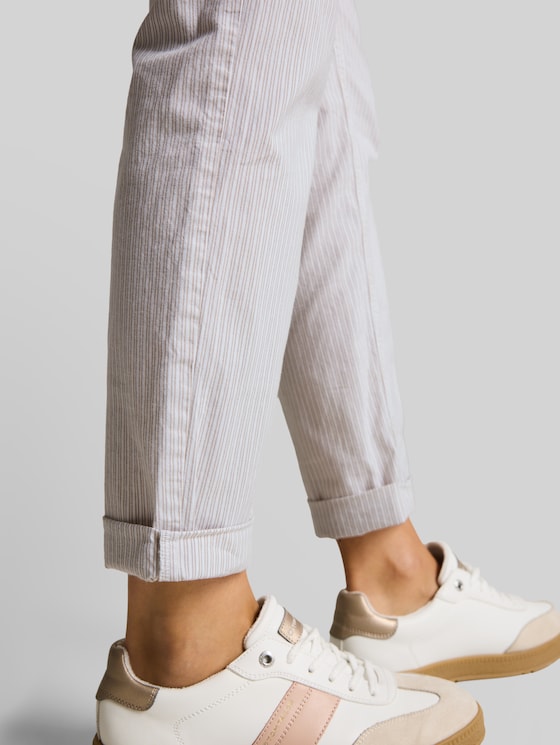 Tapered relaxed trousers with a striped pattern - white taupe irregular stripe
