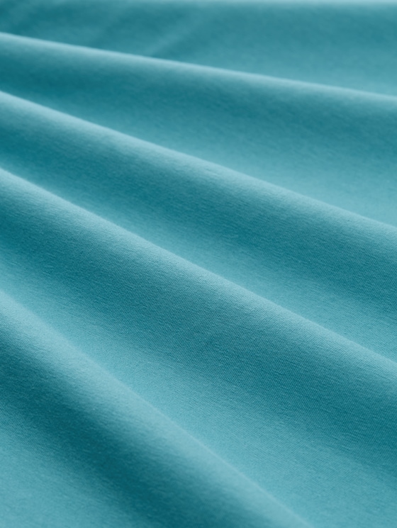 Long-sleeved shirt with a print - tropical teal