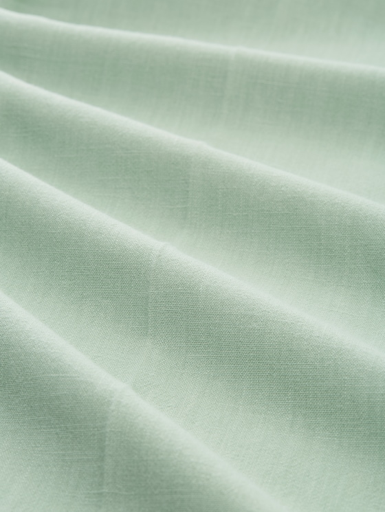 Wide-leg trousers with a 2-in-1 look - light matcha green