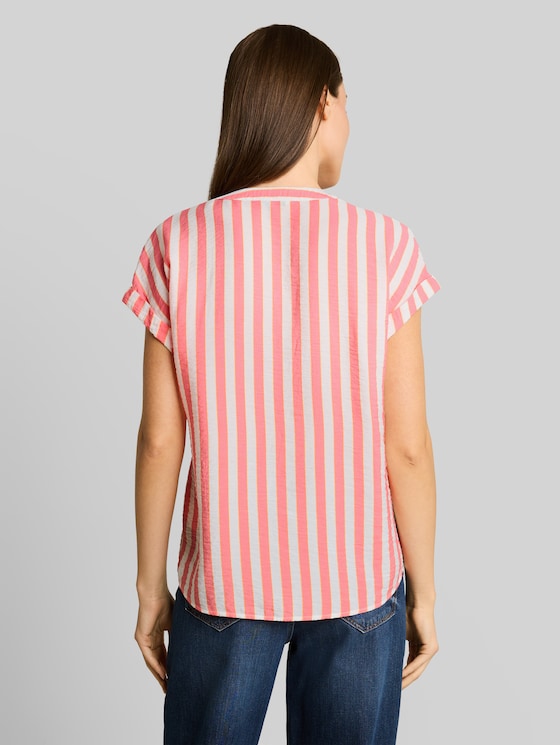 Loose-fit blouse with V-neck - pink white irregular stripe