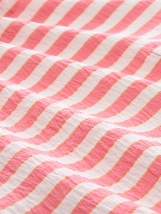 Loose-fit blouse with V-neck - pink white irregular stripe