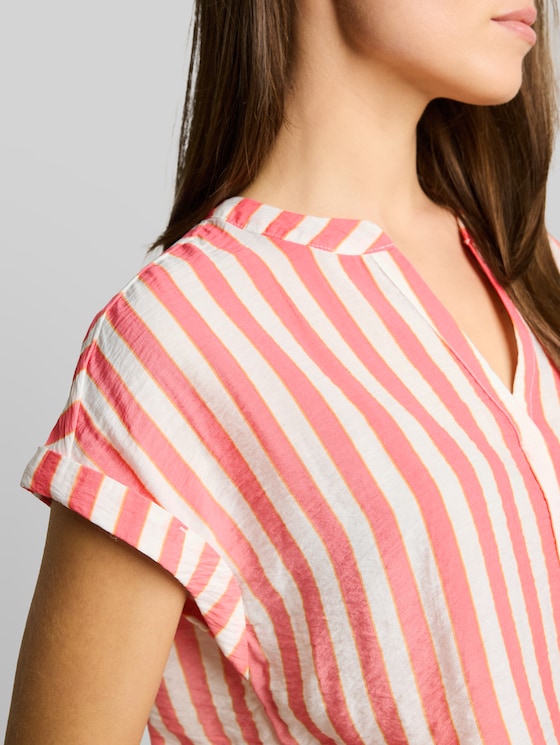 Loose-fit blouse with V-neck - pink white irregular stripe