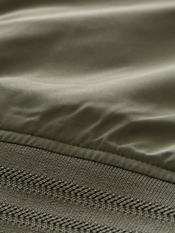 Blouson jacket with stow-away hood - faded leaf green
