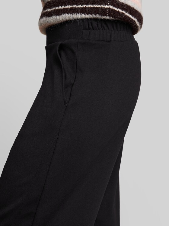 Loose-fit barrel trousers - deep black