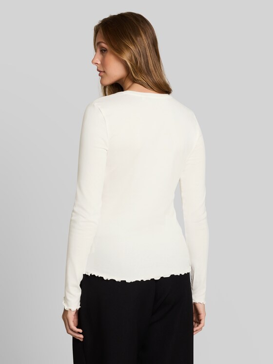 Slim-fit long-sleeved top with wavy hem - off white