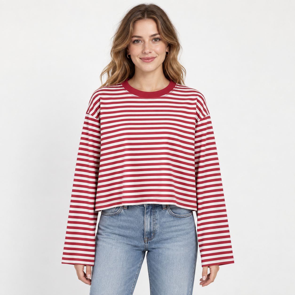Front fit view of the women's loose-fit striped long-sleeve knit top