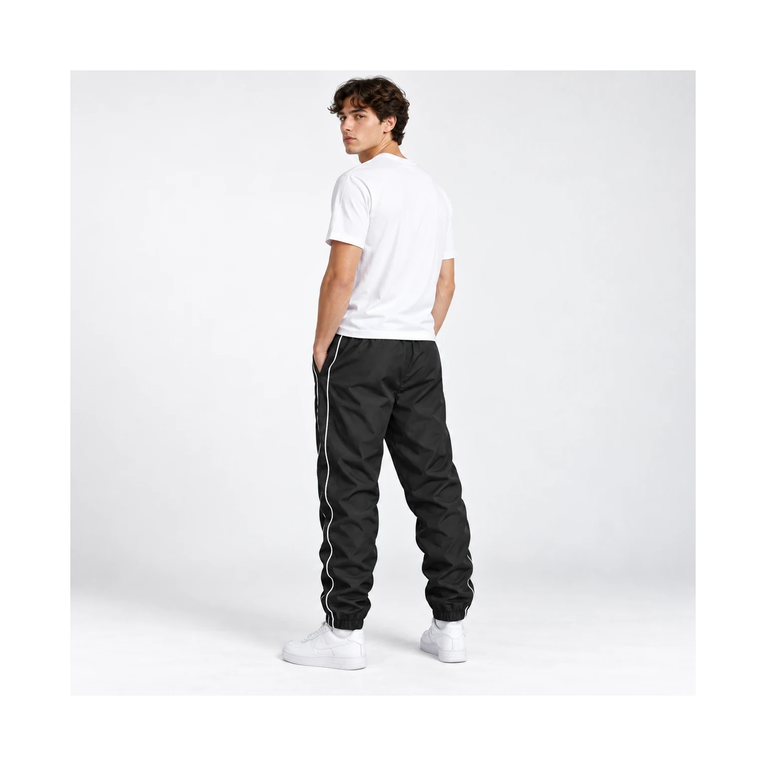 Men's black side-stripe jogger pants side and back fit