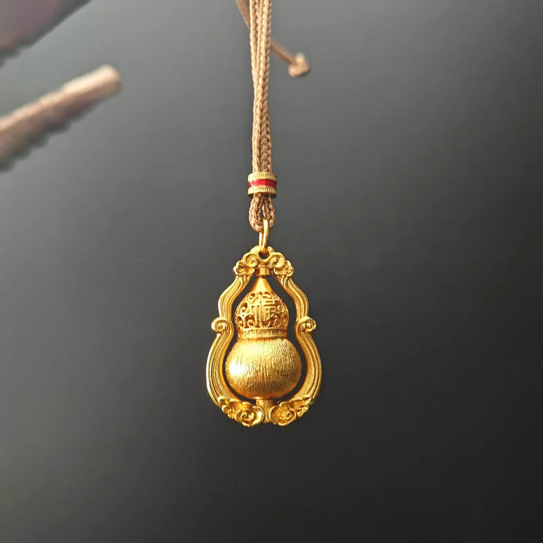 Spinning Gourd Momentum Pendant