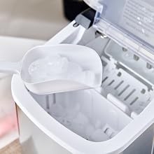 White plastic storage container or case interior, showing clean empty compartment with hinged lid.