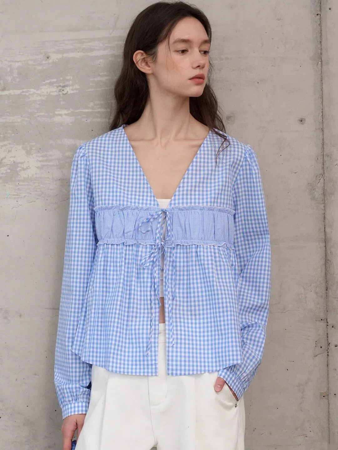Light blue plaid V-neck long-sleeved top with front tie details