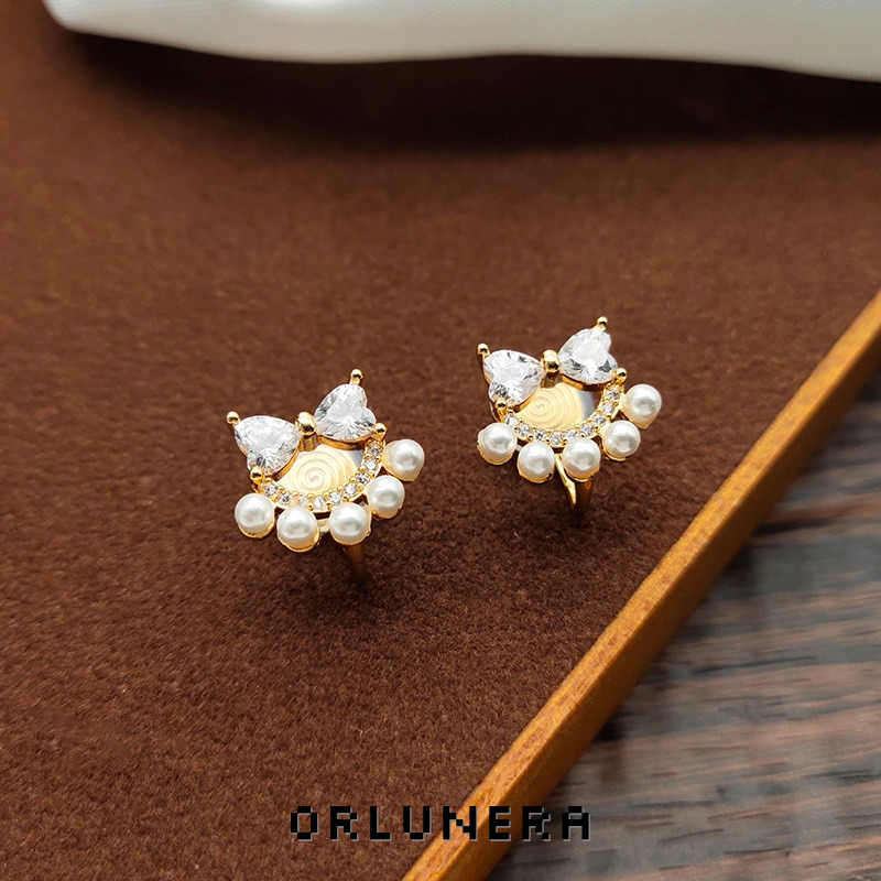 Lumière Bow Butterfly Pearl Clip-On Earrings — Edition 74 product image