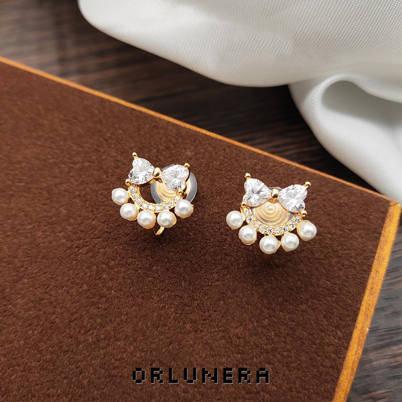 Lumière Bow Butterfly Pearl Clip-On Earrings — Edition 74 product image